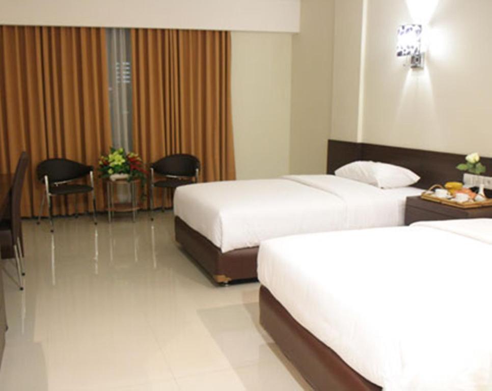 Bamboo Inn Hotel & Cafe Jakarta Zimmer foto
